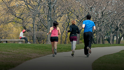 three people jogging
